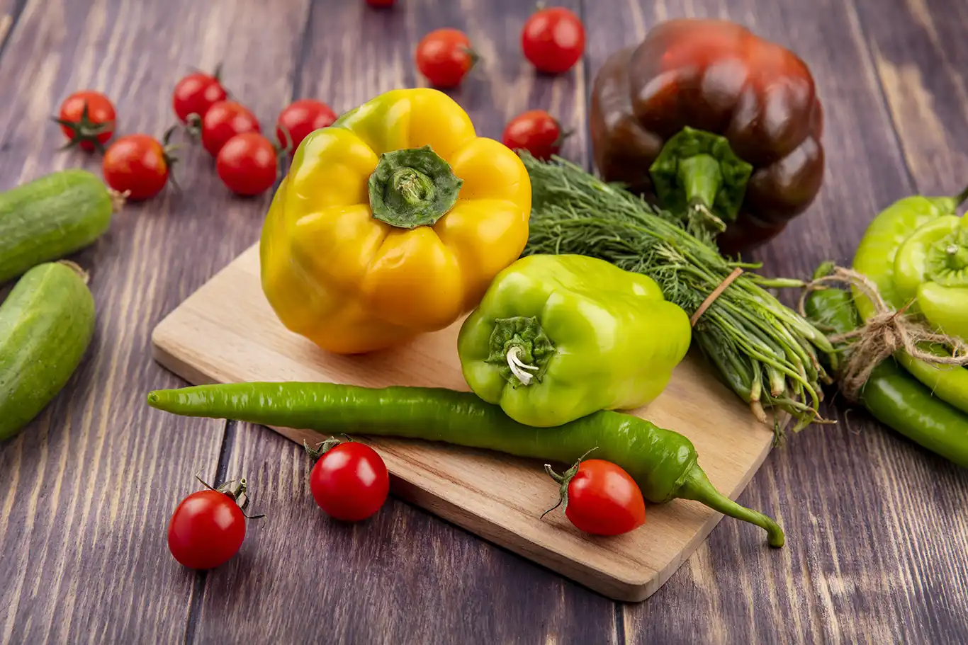 side-view-vegetables-as-peppers-dill-cutting-board-with-cucumbers-tomatoes-knife-wood